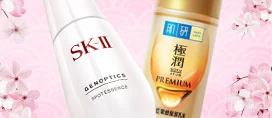 Kosmetyki japońskie SK-II i Hada Labo na różowym tle w prezentacji YesStyle.